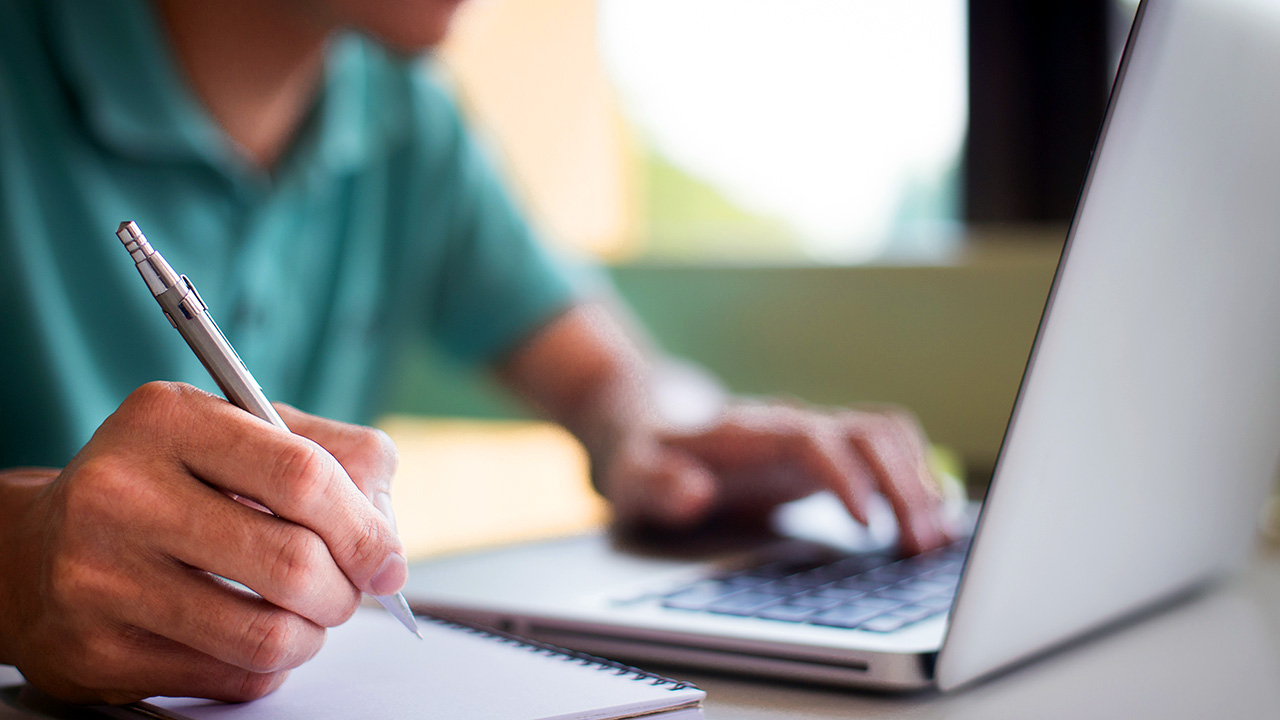 a coach works on copy for a landing page