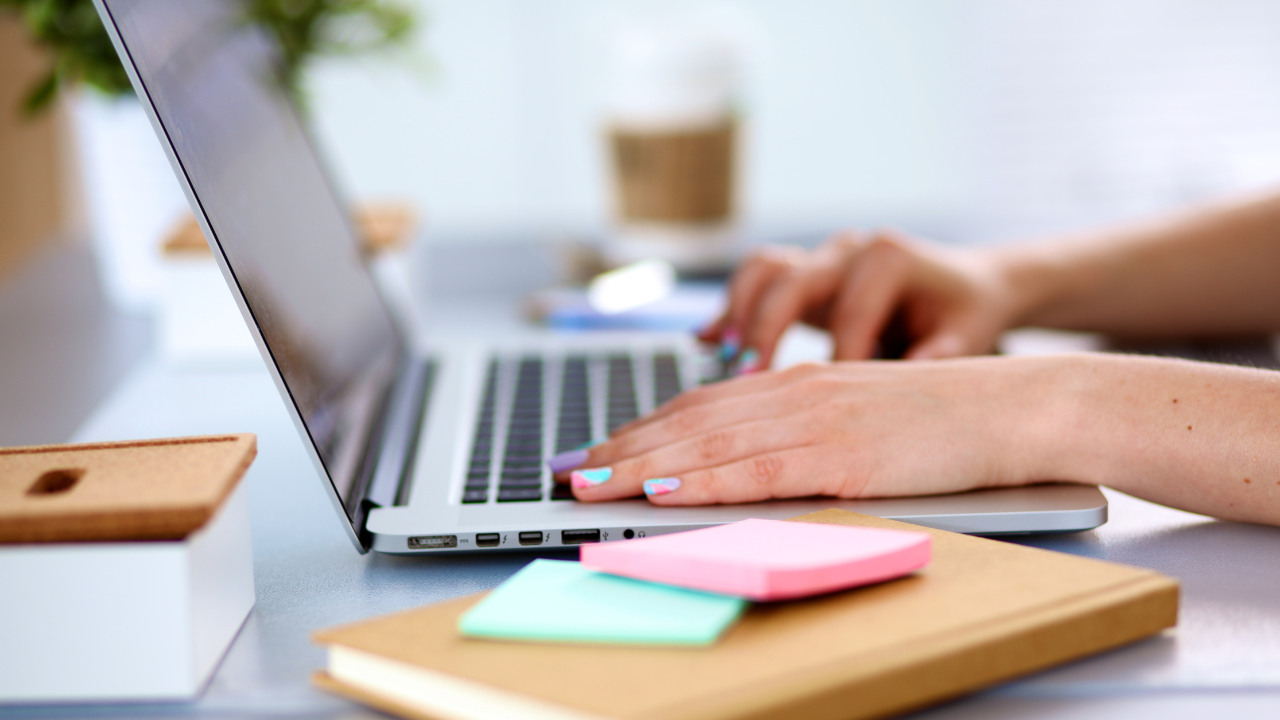 Person working on a sales funnel for their coaching business.